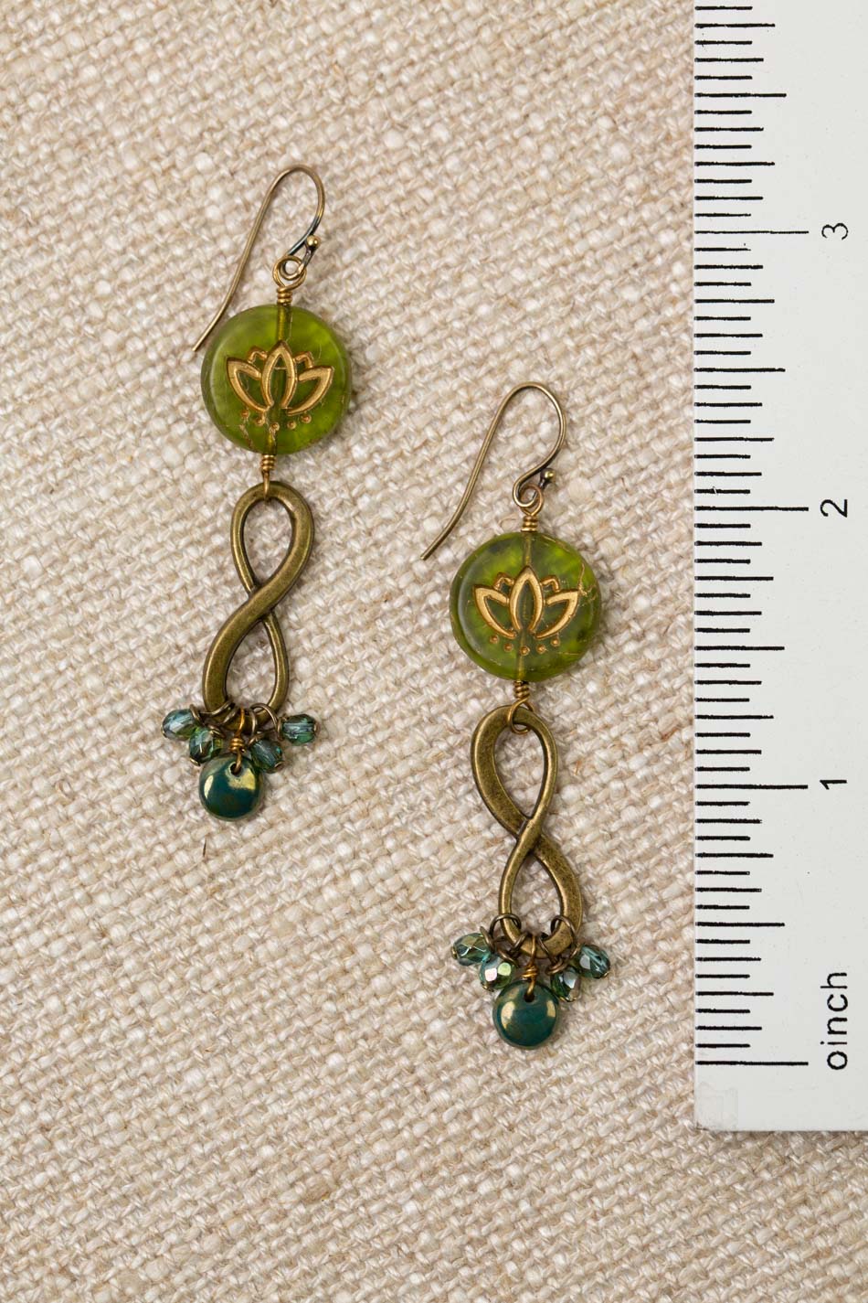 Czech Glass Infinity Symbol With Green Lotus With Gold Etching Dangle Earrings