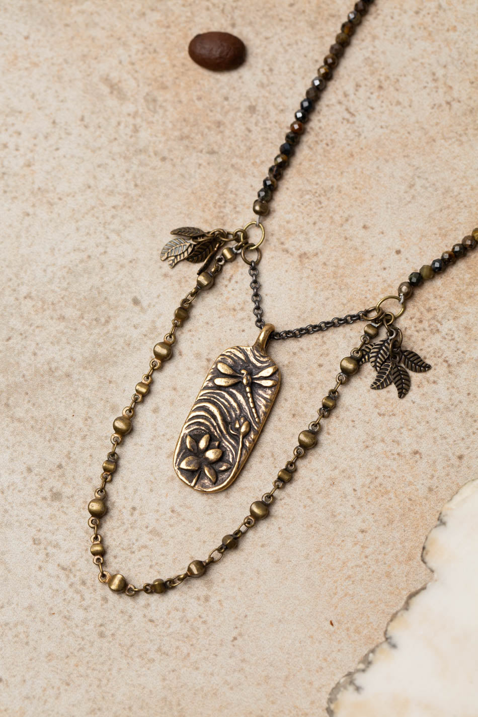 Espresso 24.75-26.75" Blue Tigers Eye, Antique Brass Dragonfly With Lily And Ripples Cluster Necklace